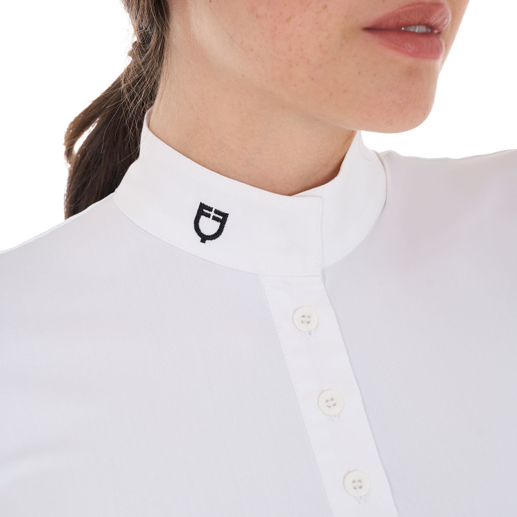 Polo de concurso con cuello mandarín ajustado de manga corta para mujer Sally Equestro Polo de concurso con cuello mandarín ajustado de manga corta para mujer Sally Equestro