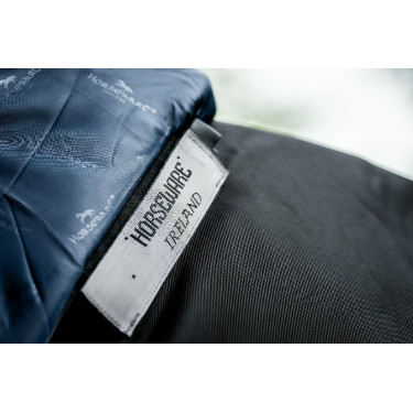 Manta Horseware Rambo 1680D Turnout Plus 100g Negro / tormenta / gris plateado