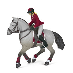 Caballo de concurso con su amazona Papo