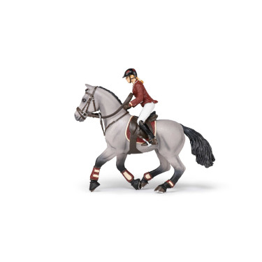 Caballo de concurso con su amazona Papo