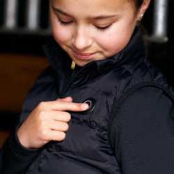 Chaleco acolchado sin mangas calefactable Imperial Riding para niños Negro