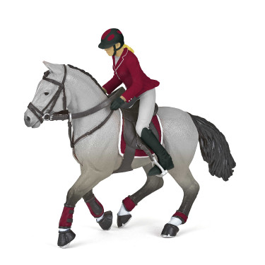 Caballo de concurso con su amazona Papo