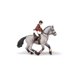 Caballo de concurso con su amazona Papo