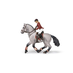 Caballo de concurso con su amazona Papo