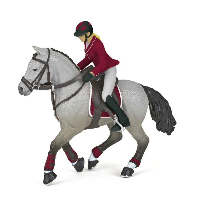 Caballo de concurso con su amazona Papo